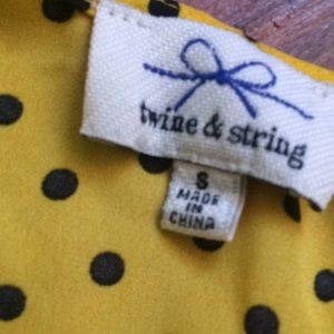 Small yellow with black dots crop top